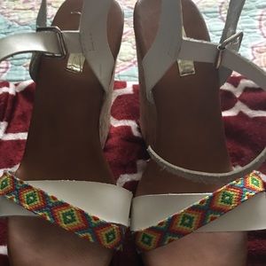 Wedged heel. Wore once.